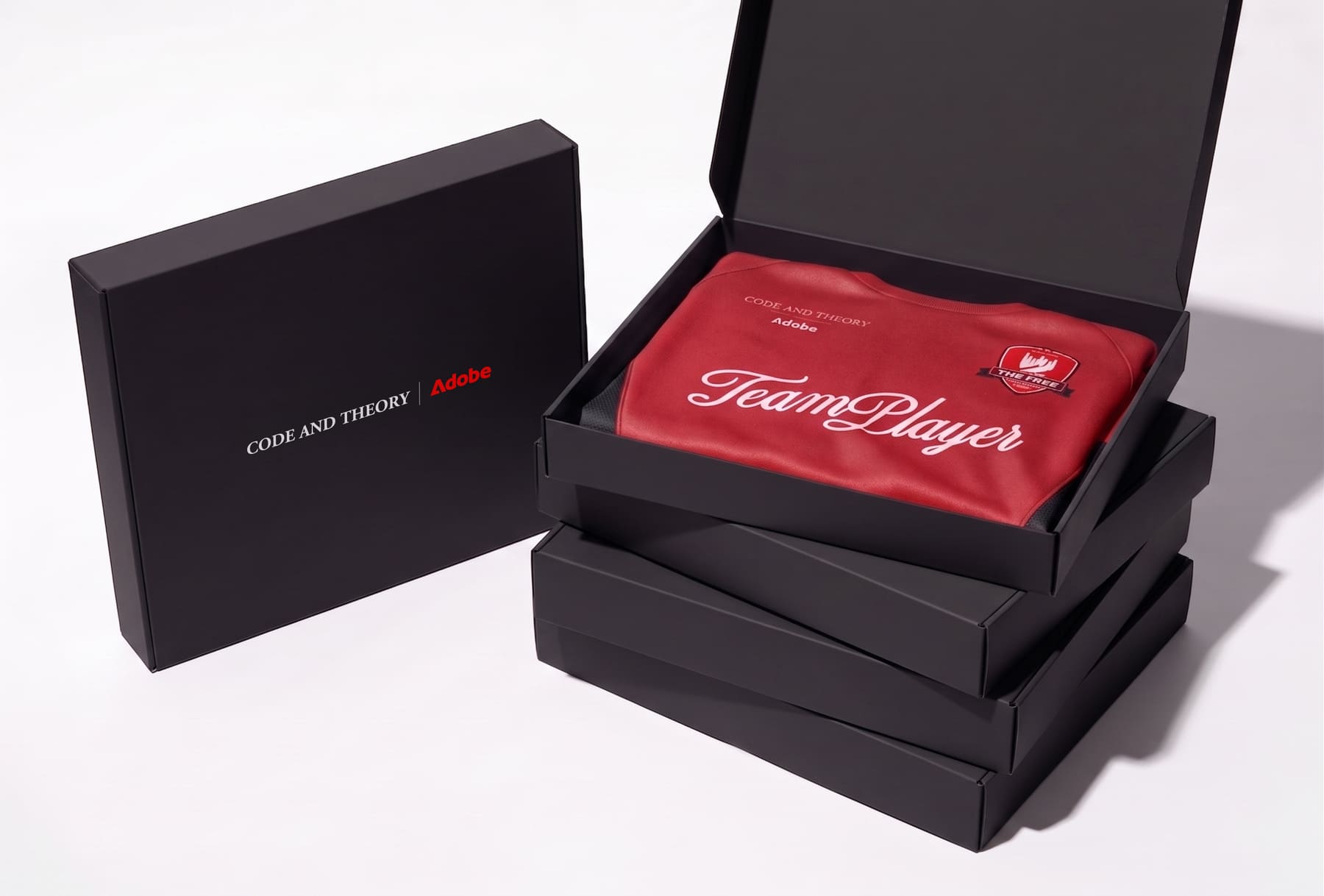 Code and Theory x Adobe TeamPlayer jersey packaged in branded boxes